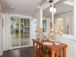 Step Out the Sliding Doors and Into the Sunshine in Beach Grass` Backyard
